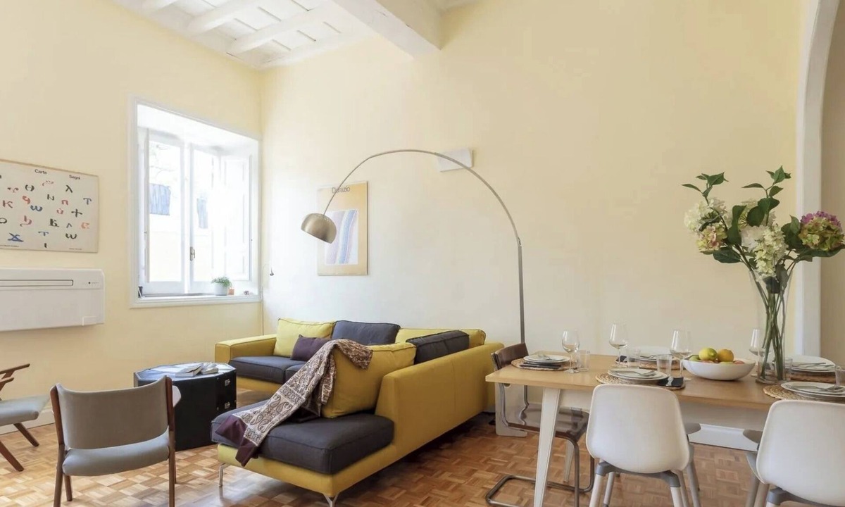 Rione VII Regola Apartment | Elegant Roman Apartment with Rooftop Access & Landmark Views