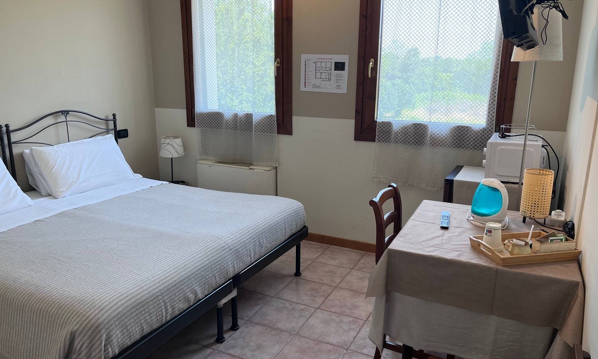 Santa Maria di Sala Apartment | Papaveri E Papere Room – Selleria in Caltana