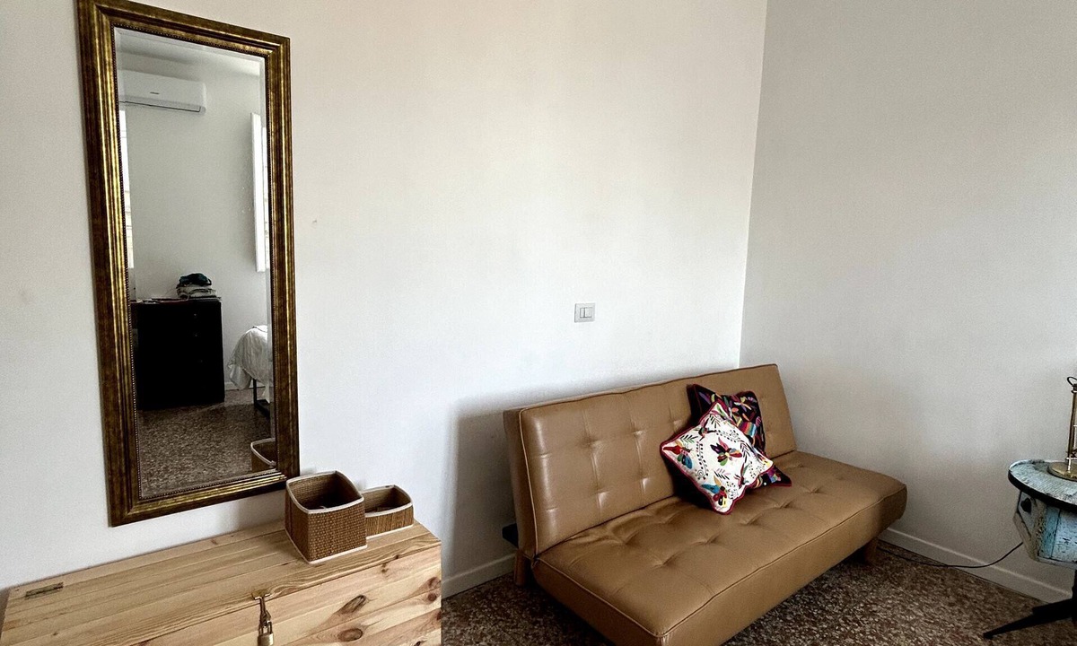 Tuscolano Apartment | Small attic with romantic terrace in the heart of Torpignattara.