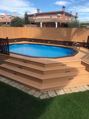 Ladispoli Villa | VILLA NEVADA Esclusiva con PISCINA Privata, Il Tuo Angolo di Pace a 5 Minuti dal MARE e 20 Minuti da ROMA
