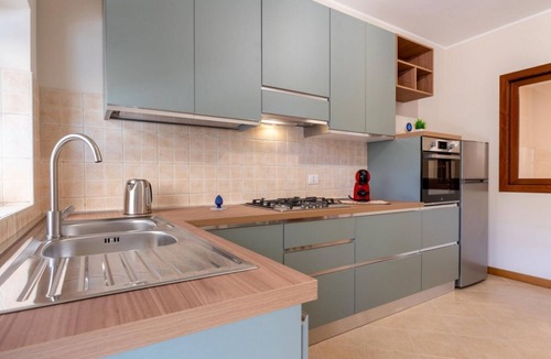 Nicolosi Apartment | A cozy and spacious 110 square meters apartment, perfect for three people, located on the ground floor of a modern building.The property is located in Nicolosi, a town in the province of Catania located on the southern slopes of Mount Etna, making it an