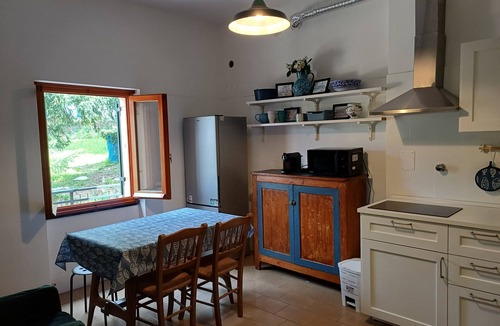 Santa Giulia House | A large terrace overlooking the sea in the quiet of olive trees for families