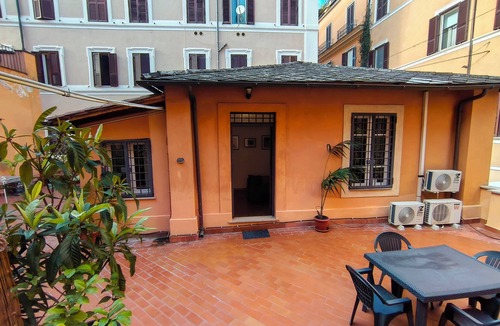 Rione IV Campo Marzio House | A small detached house with a terrace on the second floor - in the heart of Rome