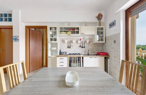 Nettuno Apartment | Apartment 'Due Passi Dalla Spiaggia' with Sea View, Wi-Fi and Air Conditioning