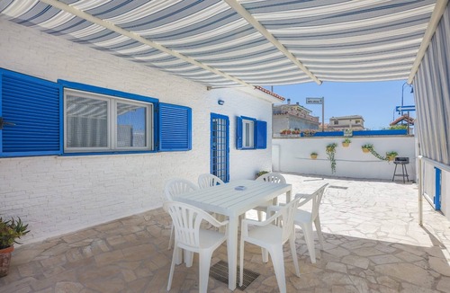 Fiumicino House | Beachfront villa in Fiumicino, terrace & sunset