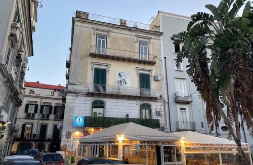 Montecalvario Apartment | Family & Friends Wing at Penthouses Dante. Private wing for groups: 35sqm kitchen/lounge, 3 ensuite bedrooms—30sqm Suite with balcony on Piazza Dante, 20sqm Superior, and a Double room. Access to panoramic rooftop over historic center's ancient domes.