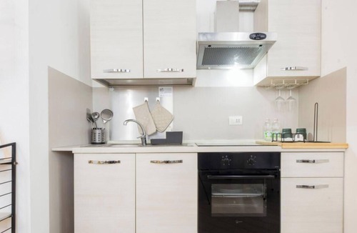 San Teodoro Apartment | Ferry port 1 min| Central 1BR| A/C| WiFi| By Tilo