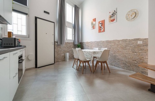 Affori House | GuestHost - A comfortable and welcoming 56 square meters studio apartment, perfect for five people, located on the ground floor of a building with a private entrance.The property is located in the Affori neighborhood, an area full of amenities, including