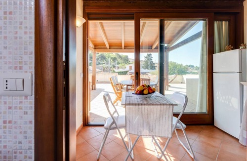 Custonaci Apartment | GuestHost - Bright and welcoming 35sqm apartment located on the first floor of an independent villa in Custonaci, a quiet countryside location a short distance from Erice and Cornino! The apartment has a large terrace with outdoor furniture and is comple