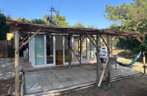 Lacona House | Holiday Home “Limone” with Private Patio, Fenced Garden, and Air Conditioning