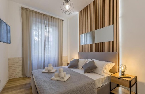 Nomentano Apartment | Imperium House - appartamento con giardino privato, 3 minuti da Metro Piazza Bologna, A-C,