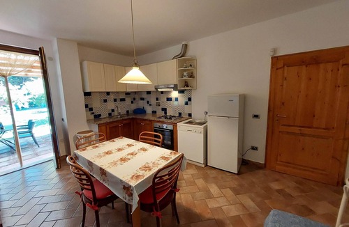 Rosignano Marittimo Apartment | Lovely flat with private covered terrace,large pool and shared garden,Wi-Fi.