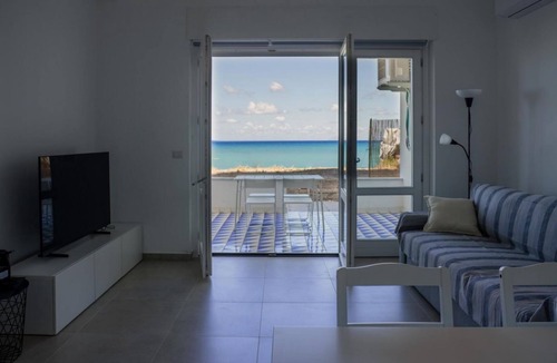 Capo d'Orlando Apartment | Maresia Apartment - terrace by the sea and direct access to the beach