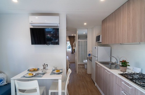 Le Rocchette House | Mobilhome im Ferienpark mit grosser Poolanlage