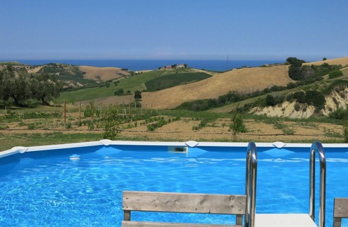 Cologna Spiaggia Villa | Nice apartment in villa with hot tub, pool, A/C, WIFI, TV, patio, pets allowed, panoramic view