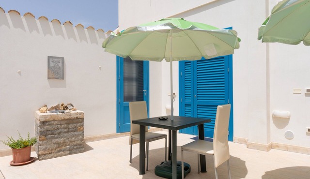 Apartment 'Appartamento Piano Terra' with Shared Terrace, Wi-Fi and Air Conditioning