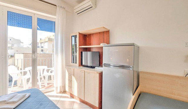 Belvilla by OYO Modern Apartment with Balcony