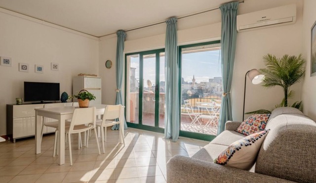 GuestHost - A comfortable and welcoming 55 square meters apartment, perfect for four people, located on the fifth floor of a building with an elevator (NOT accessible to disabled guests).The property is located in a quiet area not far from the center of