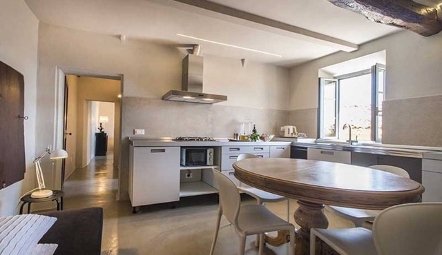 Immersed in the silence of the Tuscan countryside, the Superior apartment offers an unspoiled view of the Tuscan countryside.Equipped with a kitchenette, living room, private bathroom and 2 bedrooms, 1 double bed and 1 queen bed, it offers: stove, refrig