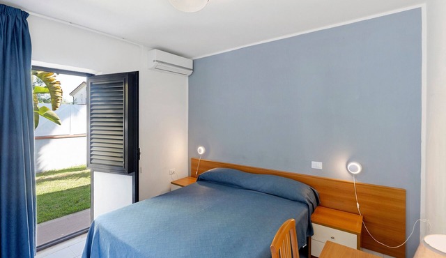 Marina Living Rooms – Economy Double Room with Shared Pool, Wi-Fi, and Air Conditioning
