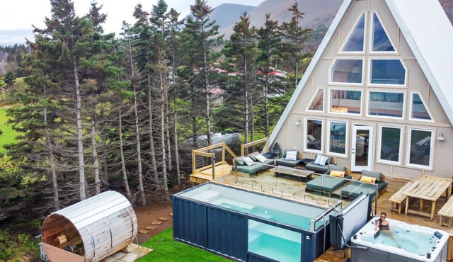 Mystical Beachfront Chalet , Hot tub , Sauna and Heated Container Pool in Cape Breton