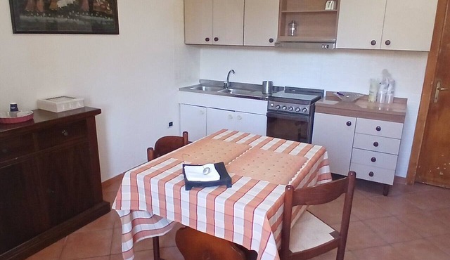 Room 'Matrimoniale Con Letto Singolo' with Shared Garden and Wi-Fi