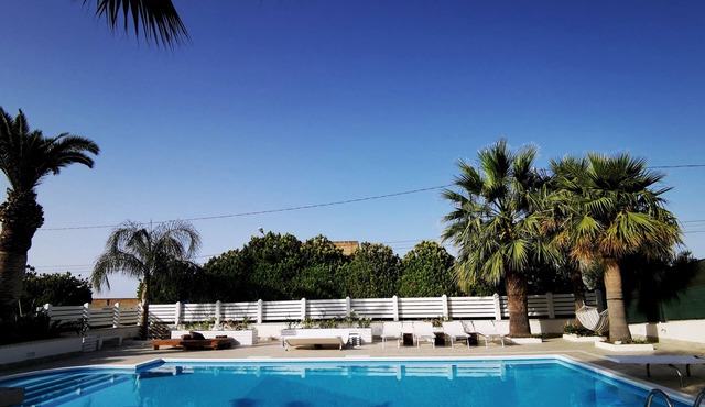 Villa Girolama villa with pool on the slopes of Erice and view of Mount Cofano